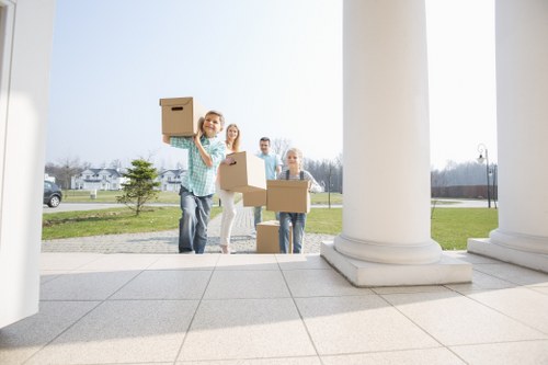 Removalists loading a van with household items